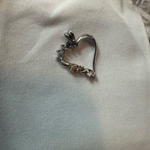 Silver heart charm with gems